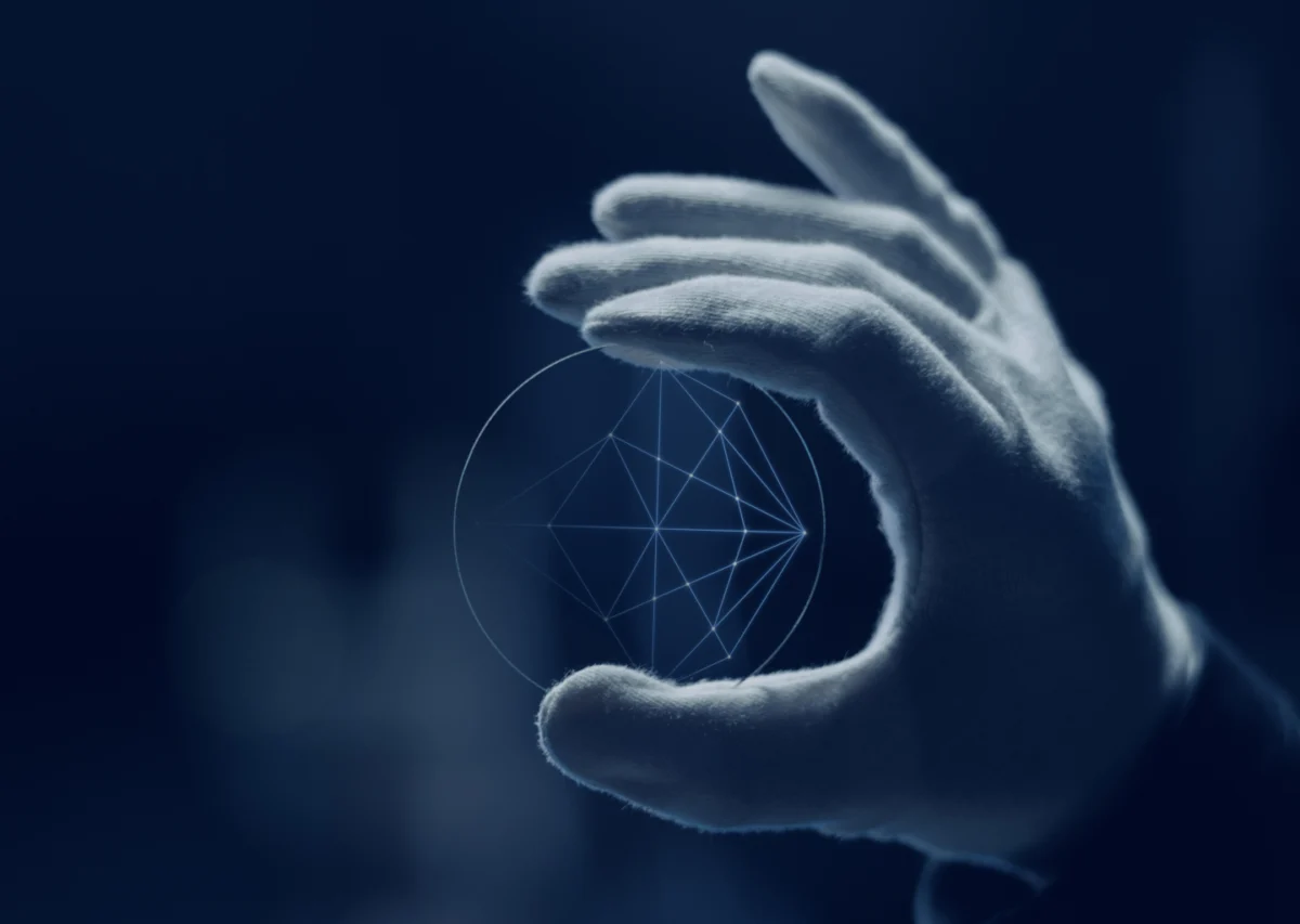 White-gloved hand holding a clear lens in an Essilor Crizal campaign