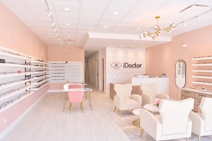 Frame displays and welcoming seating inside iDoctor in Glendale Heights